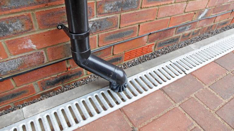 gladde tuintegels drainage hemelwaterafvoer